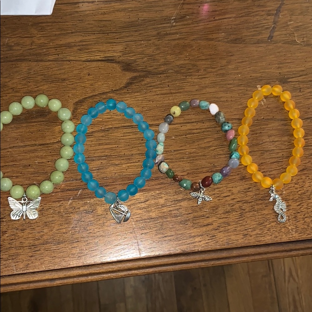 Bracelets beaded with charms. Brand new